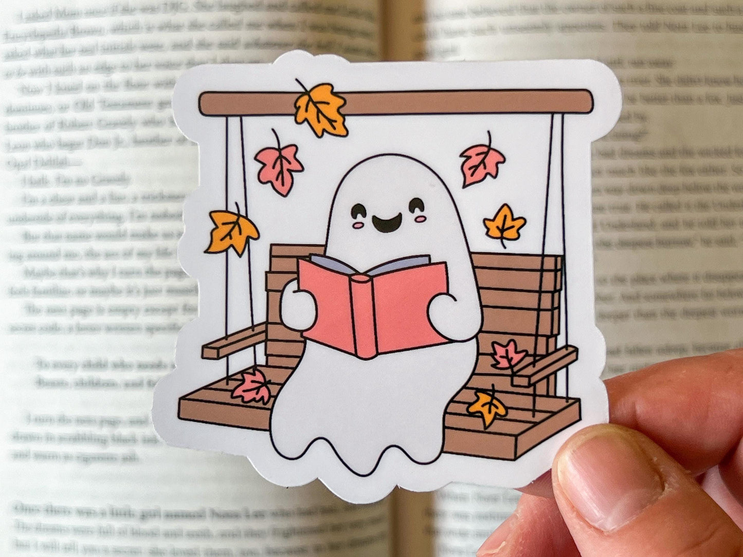 Ghost Reading on Porch Swing Fall Cozy Vinyl Sticker