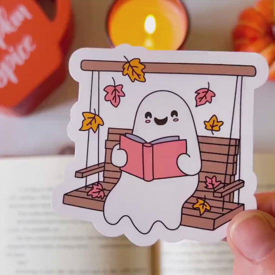 Ghost Reading on Porch Swing Fall Cozy Vinyl Sticker